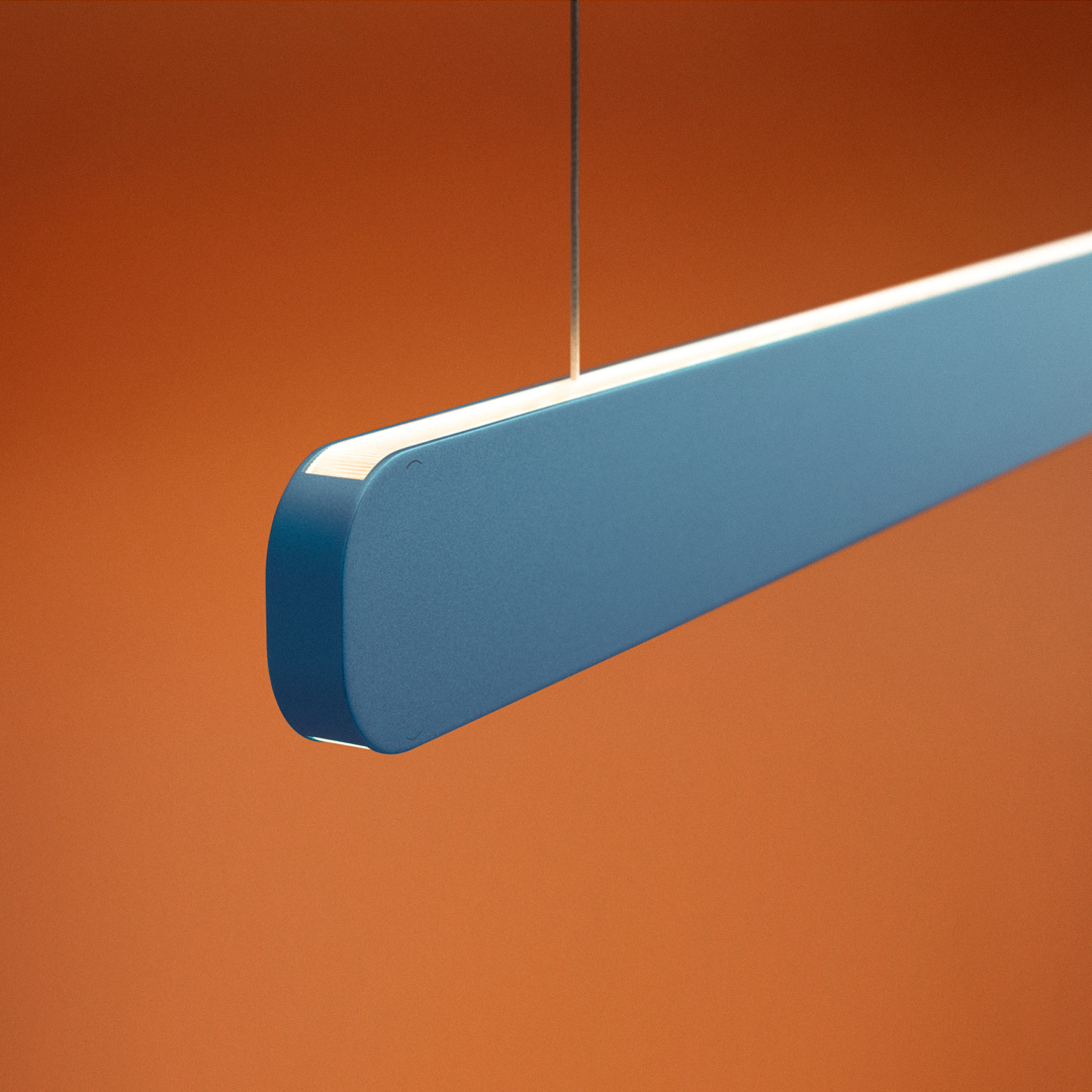 Occhio Mito volo pendant luminaire colors by occhio in blu vivace on orange backround close up