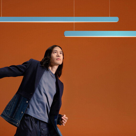 Occhio Mito volo pendant luminaire colors by occhio in blu vivace on orange backround